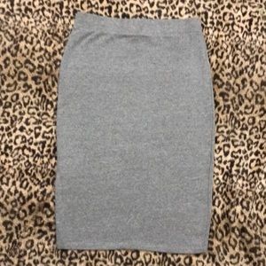 High waited over the knee skirt .